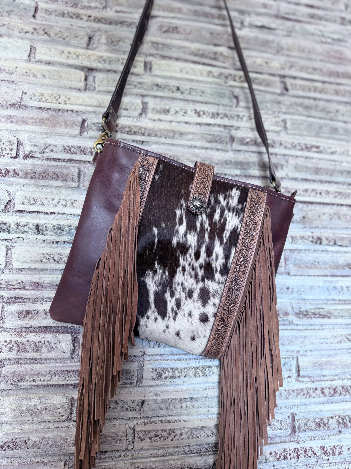 Leather tooled cowhide bag W/fringe 